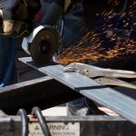 Man using angle grinder